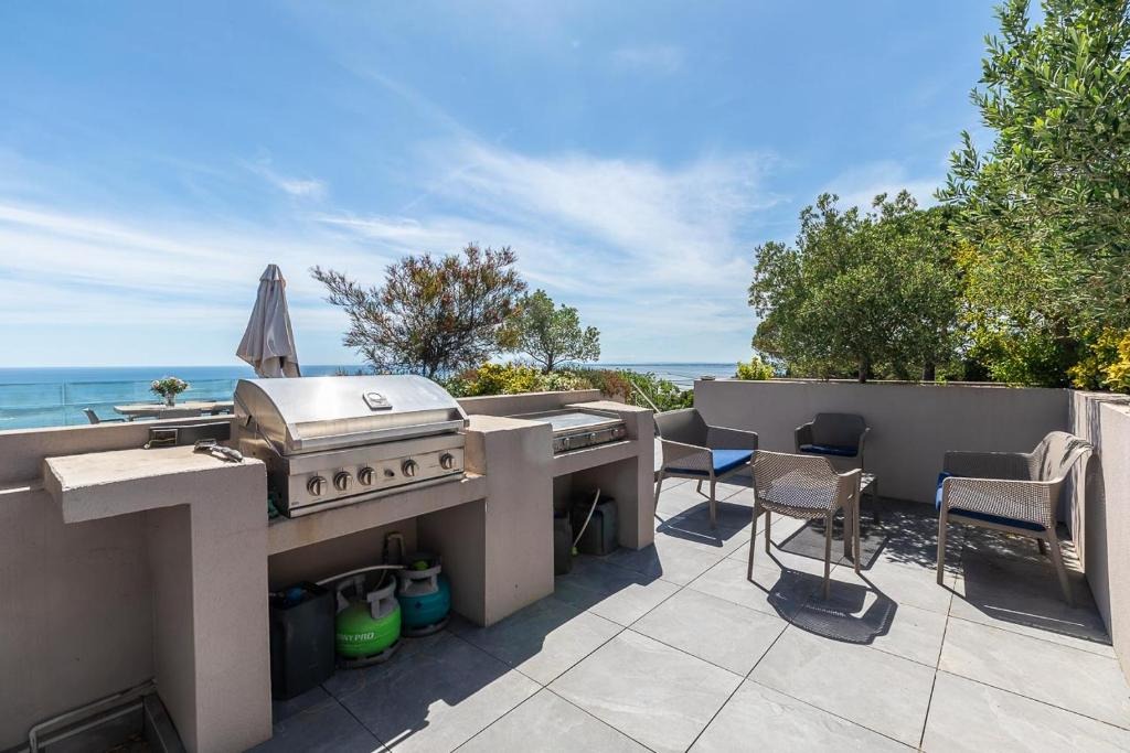 Villa avec barbecue, jacuzzi et jardin | Vue mer — photo 18